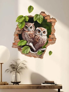 Detail eines 3D-Wandaufklebers mit Eulen und Blättern, die aus einer Ziegelwand hervorkommen