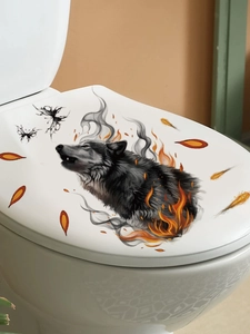 Detail of howling black wolf wall sticker with fire and smoke on a toilet cover