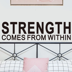 Inspirational Strength comes from within wall decal in a modern minimalist bedroom setting