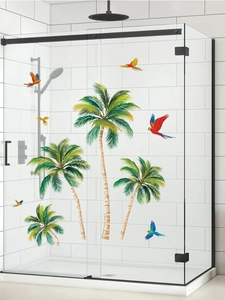 Detail of self-adhesive tropical palm trees and parrots wall stickers on glass shower door