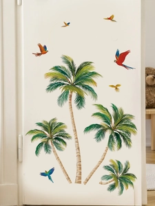 Detail of tropical palm trees and colorful parrots wall decals on a clean white cabinet door