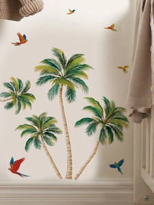Detail of tropical palm trees and colorful macaws wall decals on a cozy living room wall