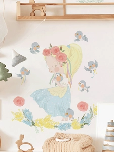 Detail of girl and bird wall stickers in pastel colors for kids room decoration