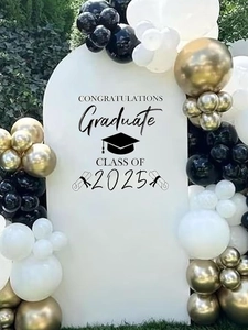 Detail of 2025 graduation wall decal on arch backdrop with black and gold balloons