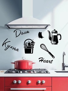 Close-up detail of black PVC kitchen wall decals with kettle and utensil motifs