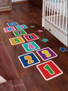 Colorful number hopscotch floor decals 1-10 with stars on dark wooden floor