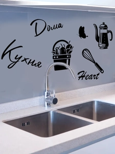 Close-up of PVC kitchen wall stickers with Russian text and culinary icons on gray wall