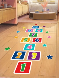 Close-up of colorful self-adhesive hopscotch floor decals with numbers 1-10 and stars