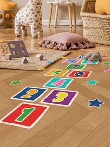 Close-up of colorful self-adhesive hopscotch floor stickers for indoor nursery playroom decor