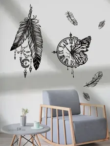 Detail of black feather dreamcatcher and butterfly clock wall decals in a modern living room