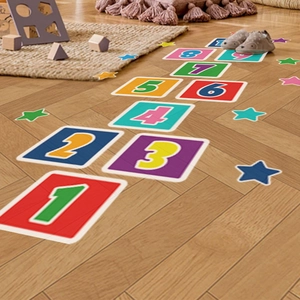 Colorful hopscotch floor decals with numbers 1-9 and stars for kids room decor