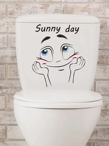 Détail du sticker visage souriant Sunny day sur un réservoir de toilettes en céramique