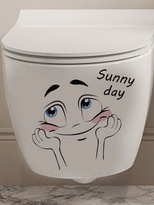 Détail d'autocollant Sunny day avec visage souriant sur un abattant de WC blanc