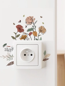 Close-up of floral wall decals with Morandi tones and butterflies on white light switch