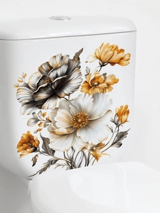 Detail of vintage hand-painted floral toilet stickers on white ceramic bathroom surface
