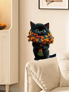 Detail eines süßen schwarzen Katzenwandaufklebers mit buntem Sonnenblumenstrauß