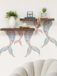 Detail of iridescent mermaid tail wall stickers with gold glitter scales for bedroom decor