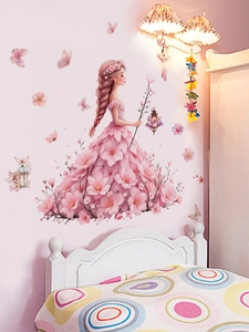 Detail of pink butterfly girl wall sticker on a bedroom wall with soft warm lighting