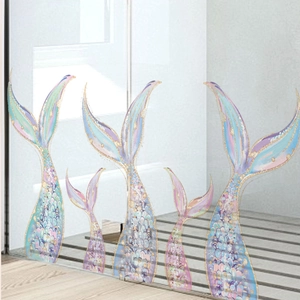 Set of dreamy mermaid tail wall stickers in pastel colors with gold glitter details