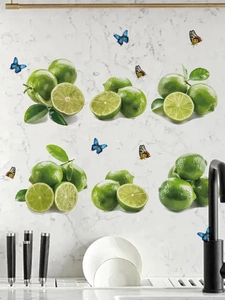 Detail of waterproof green lemon and butterfly PVC wall stickers on marble texture