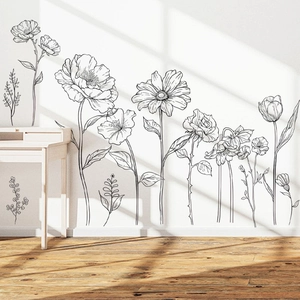 Minimalist black line floral wall stickers featuring roses and sunflowers on white walls