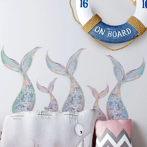 Whimsical blue and purple mermaid tail wall stickers with sparkling scales for home decor