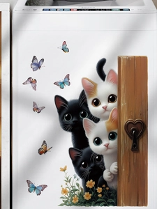 Detail of 3D cartoon cat and butterfly wall stickers applied on a home appliance