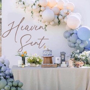 Heaven Sent baby shower balloon arch kit with Morandi blue and sage green decorations