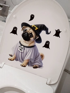 Detail of Halloween toilet lid sticker featuring a pug ghost with a wizard hat and small spirits