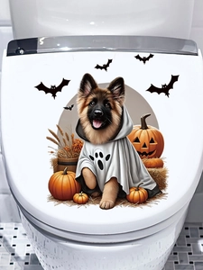 Detail of Halloween toilet lid decal showing German Shepherd in ghost costume and pumpkins