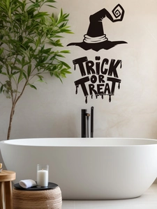 Detail of Trick or Treat wall decal with wizard hat silhouette on bathroom wall