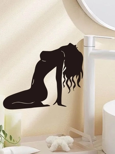 Detail view of a black silhouette wall sticker showing a female artistic pose in a bathroom