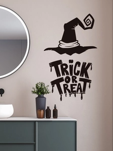 Detail of black Halloween wall sticker featuring a witch hat and Trick or Treat text