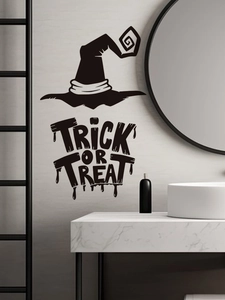 Detail showing black vinyl Halloween wall sticker with witch hat and Trick or Treat text
