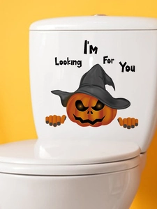 Detail of Halloween pumpkin sticker with witch hat and I'm Looking For You text decoration