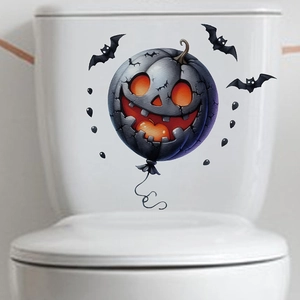 Halloween pumpkin balloon and bats wall decal on white toilet tank for spooky home decor