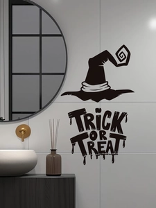 Detail of Halloween Wizard Hat and Trick or Treat black vinyl wall sticker in a bathroom