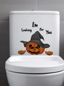 Detail view of Halloween pumpkin toilet sticker with 'I'm Looking For You' text decoration