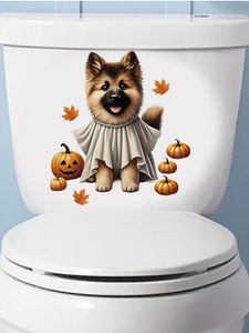 Detail view of ghost puppy and pumpkin stickers applied on a white toilet tank