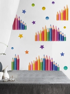 Detail of colorful pencil wall decals with decorative stars for a creative kids' room vibe