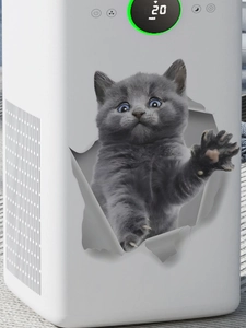 Détail d'un autocollant 3D d'un chat gris mignon traversant une surface blanche avec réalisme