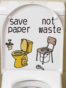 Detail of toilet seat decal showing Save Paper quote and creative paper roll illustration