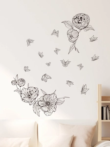 Detailed wall decal featuring black floral peony clusters and flying butterflies on white wall