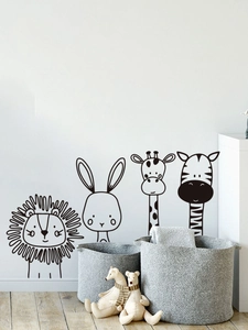 Dettaglio di adesivi murali animali neri minimalisti per la cameretta dei bambini e decoro