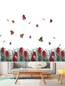 Detail of red flower garden and butterfly wall stickers on a minimalist white living room wall