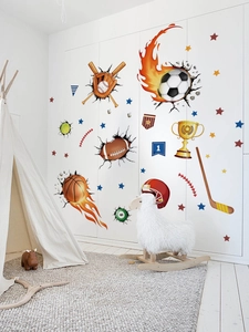Detail of 3D sports wall stickers featuring soccer and basketball on a white cabinet
