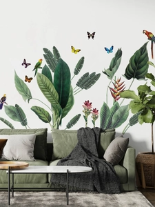 Tropical rainforest wall sticker featuring parrots and banana leaves on a white wall