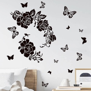 Black floral wall stickers with roses and butterflies for a minimalist bedroom wall decor