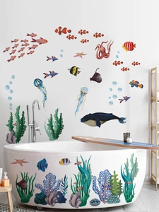 Detailed view of ocean life wall stickers with colorful fish and coral on bathroom tiles