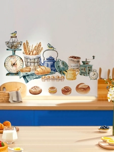 Detailed view of watercolor kitchen wall stickers with coffee pots and bread on a cafe wall